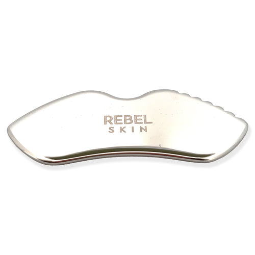 Stainless steel REBEL SCULPT tool for facial massage, tension relief, and lymphatic drainage.